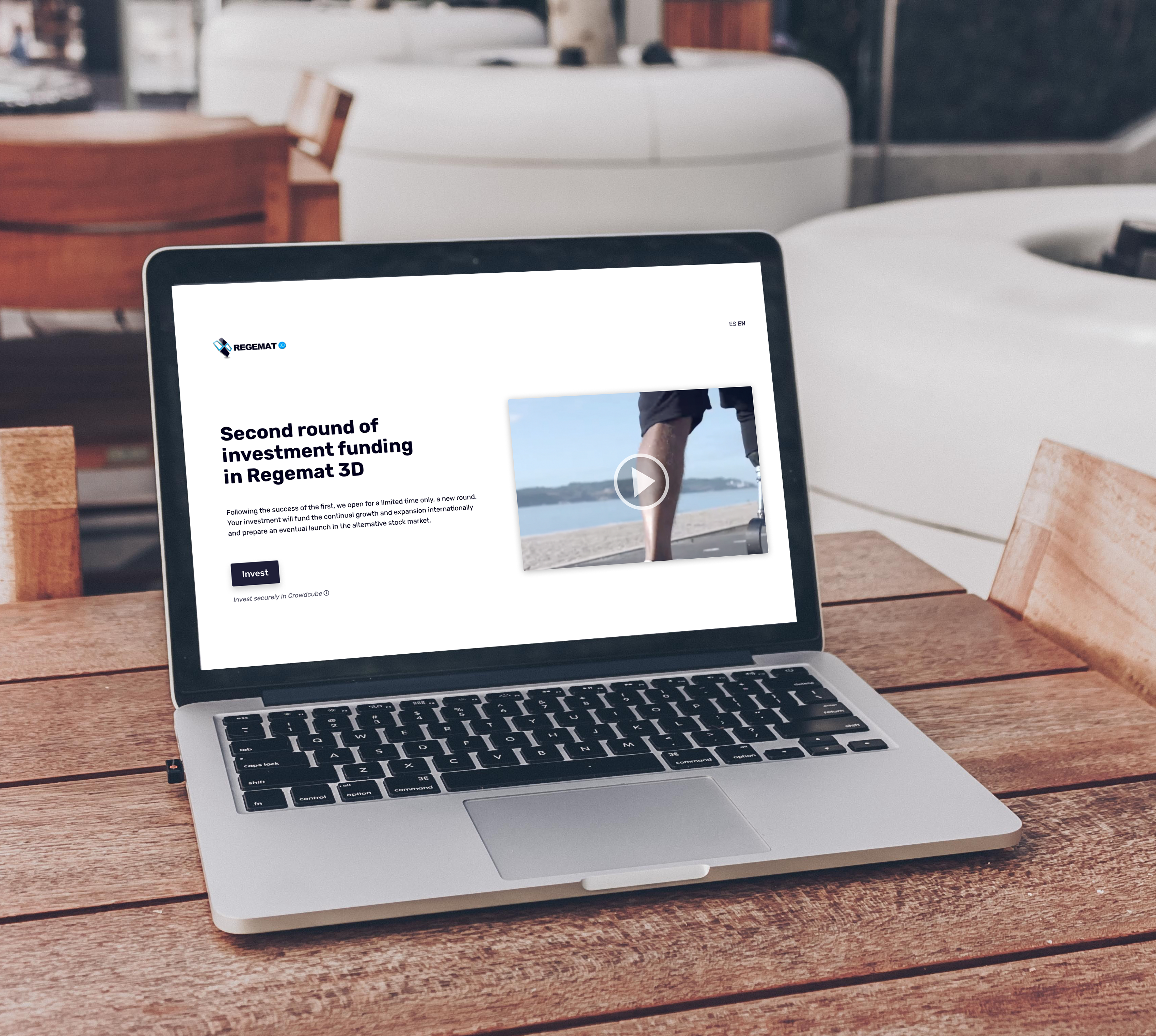 Image showing the landing page of Regemat on a table